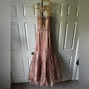 The dress is from Camille La vie, colors rose gold and gold and size 8